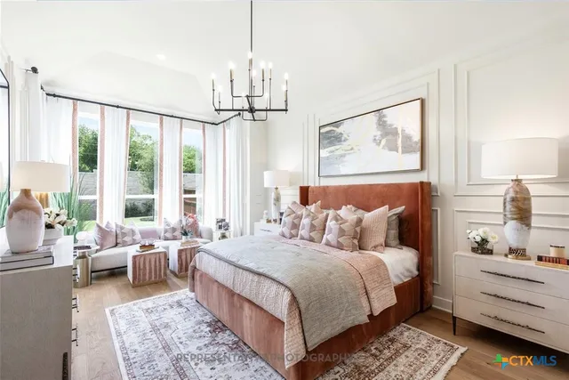 a bed room with a bed and a window