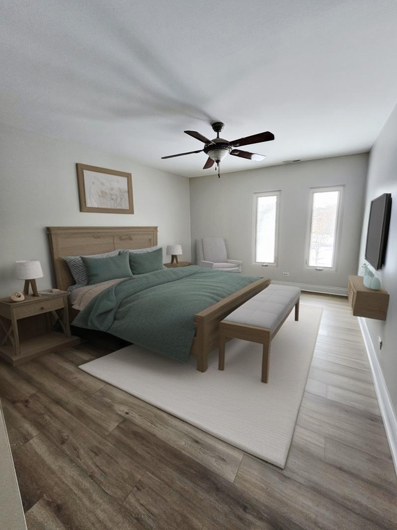 1550 Sandpebble Drive, Unit 210 Wheeling, IL 60090 - Photo 18 of 22 a living room with furniture and a wooden floor