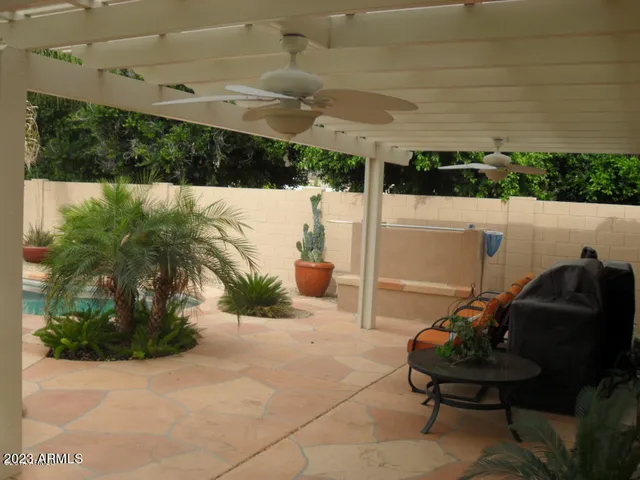 a view of balcony with furniture