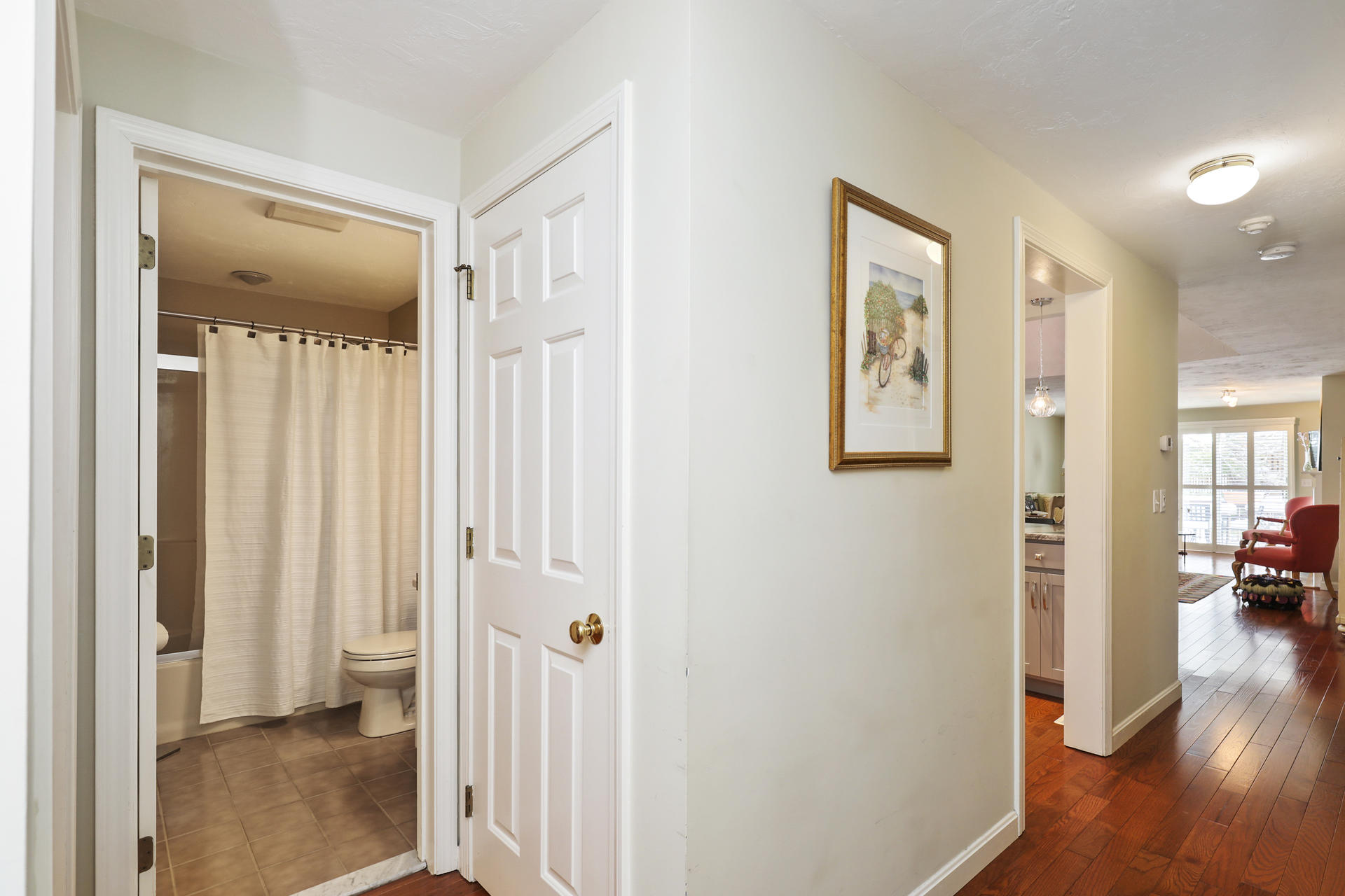 21 Portside Drive Mashpee, MA 02649 - Photo 13 of 20 a view of a hallway with wooden floor and windows