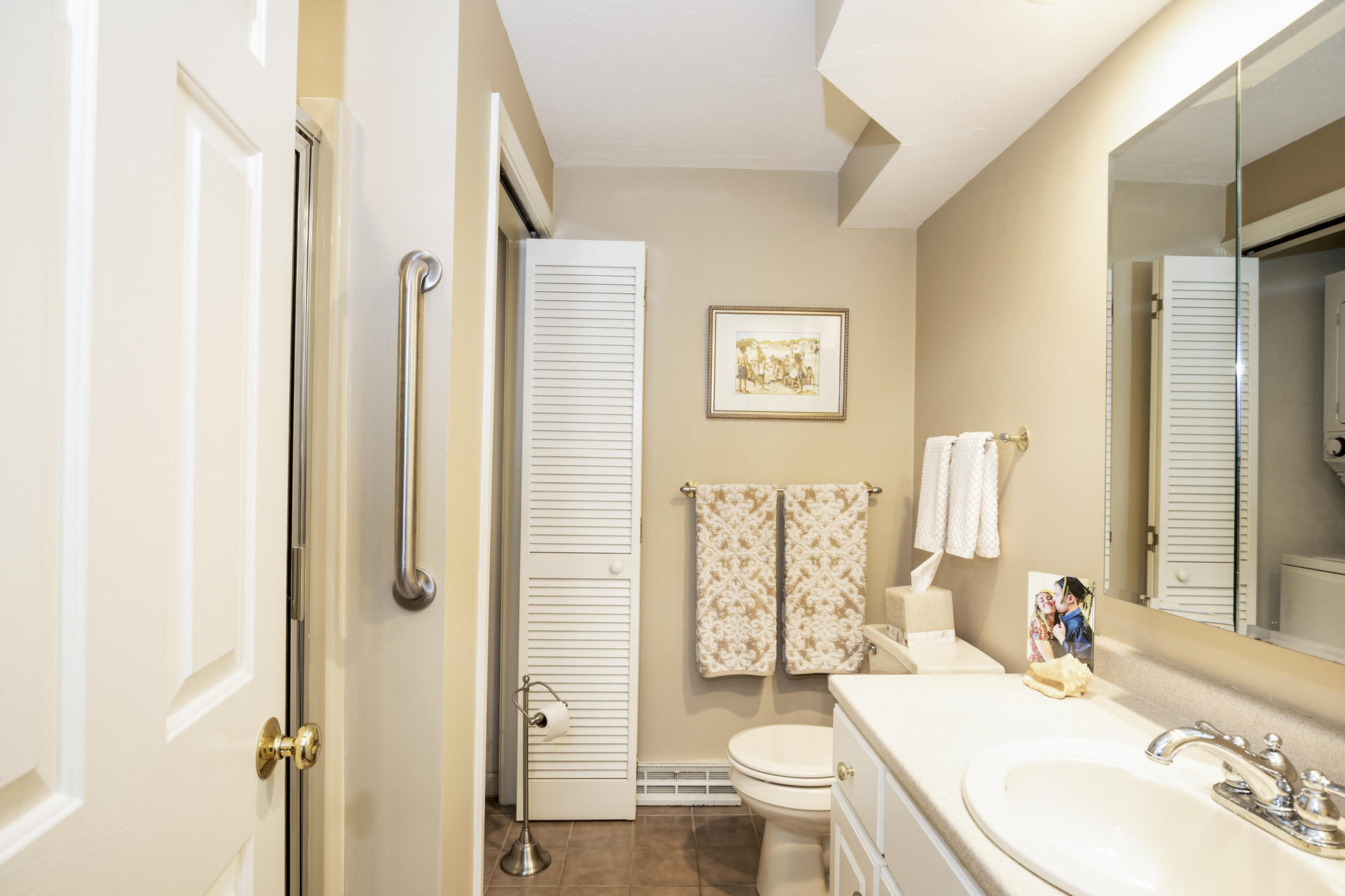 21 Portside Drive Mashpee, MA 02649 - Photo 15 of 20 a bathroom with a sink toilet and shower