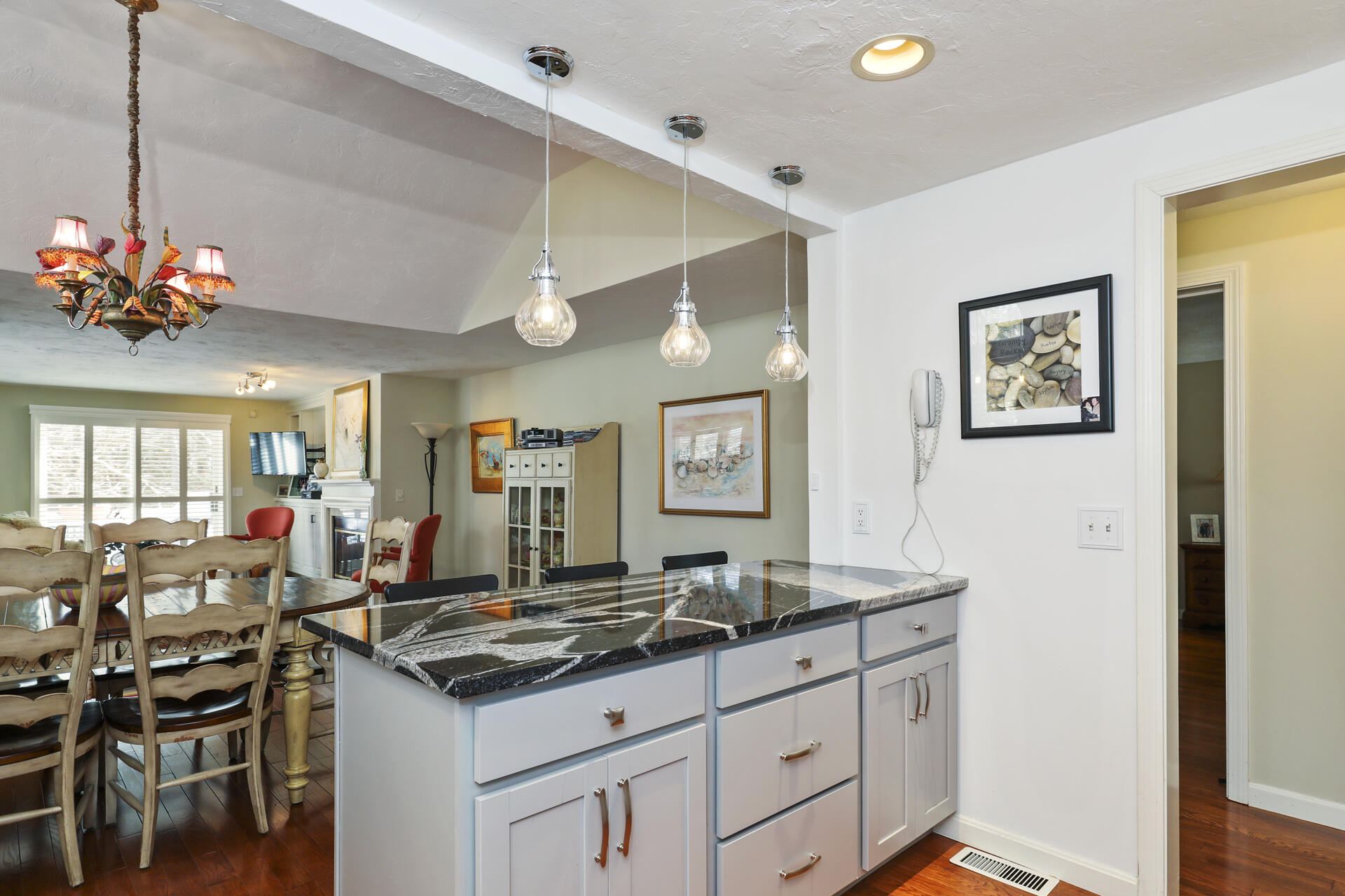 21 Portside Drive Mashpee, MA 02649 - Photo 3 of 20 a kitchen that has a lot of cabinets a sink and a stove