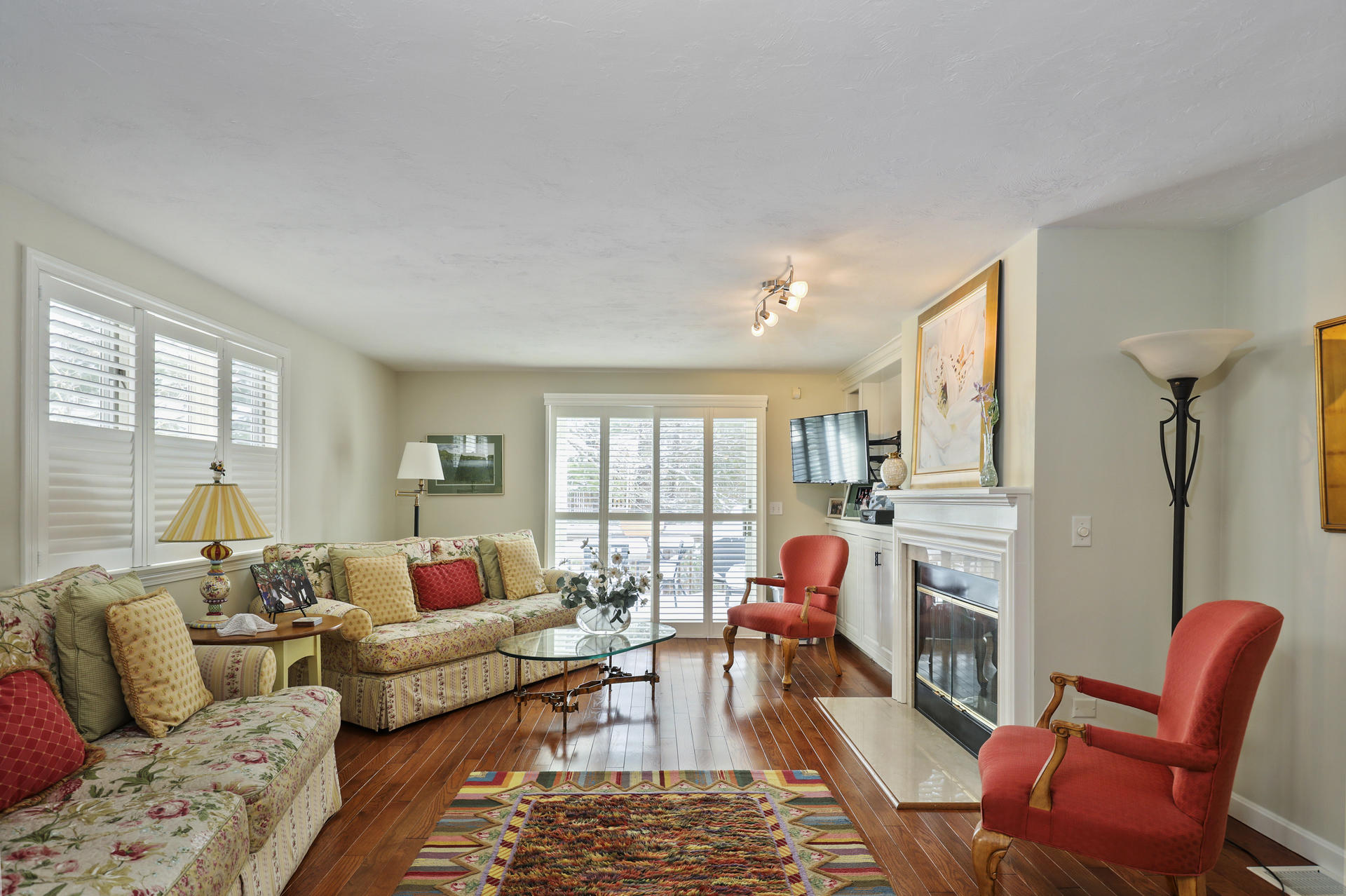 21 Portside Drive Mashpee, MA 02649 - Photo 7 of 20 a living room filled with furniture and a large window