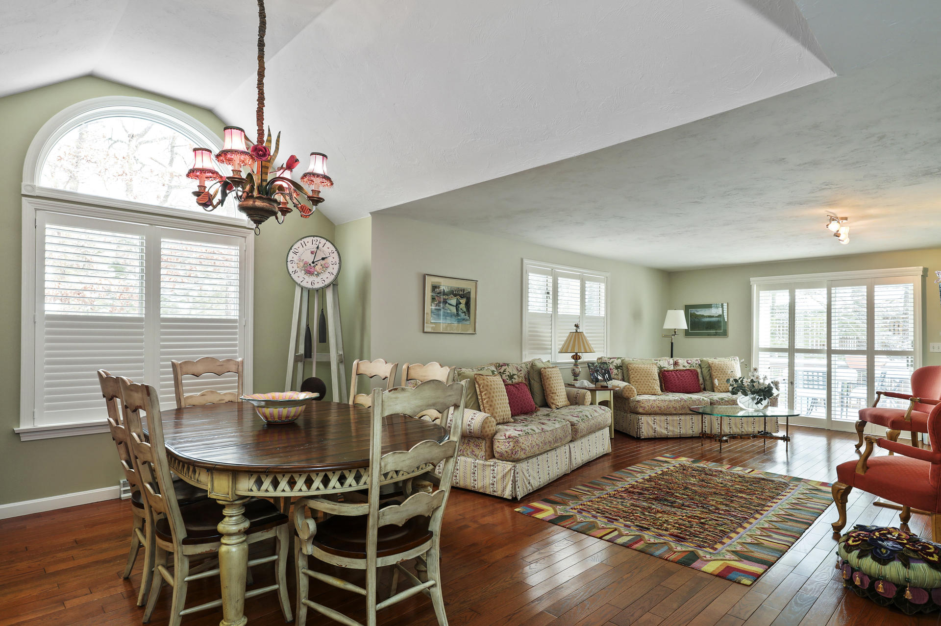 21 Portside Drive Mashpee, MA 02649 - Photo 8 of 20 a living room with furniture dining table and a large window
