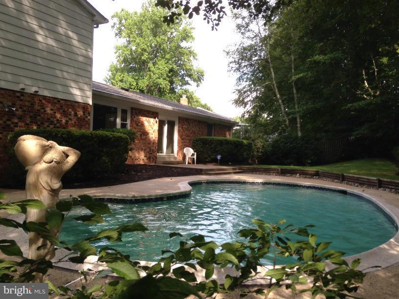 9415 Retriever Road Springfield, VA 22153 - Photo 27 of 29 Pool and surrounding deck area