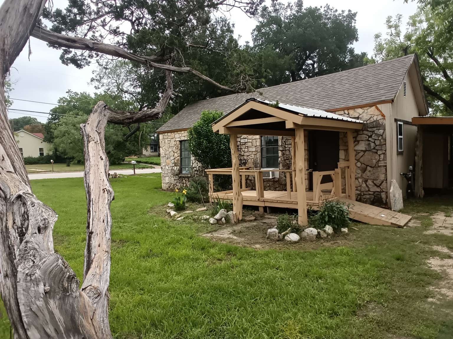 308 North Ridge Street Lampasas, TX 76550 - Photo 6 of 16 a backyard of a house with table and chairs