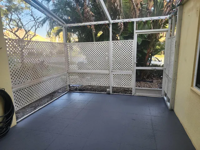 a view of a balcony with door