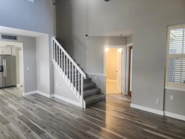 a view of entryway with wooden floor