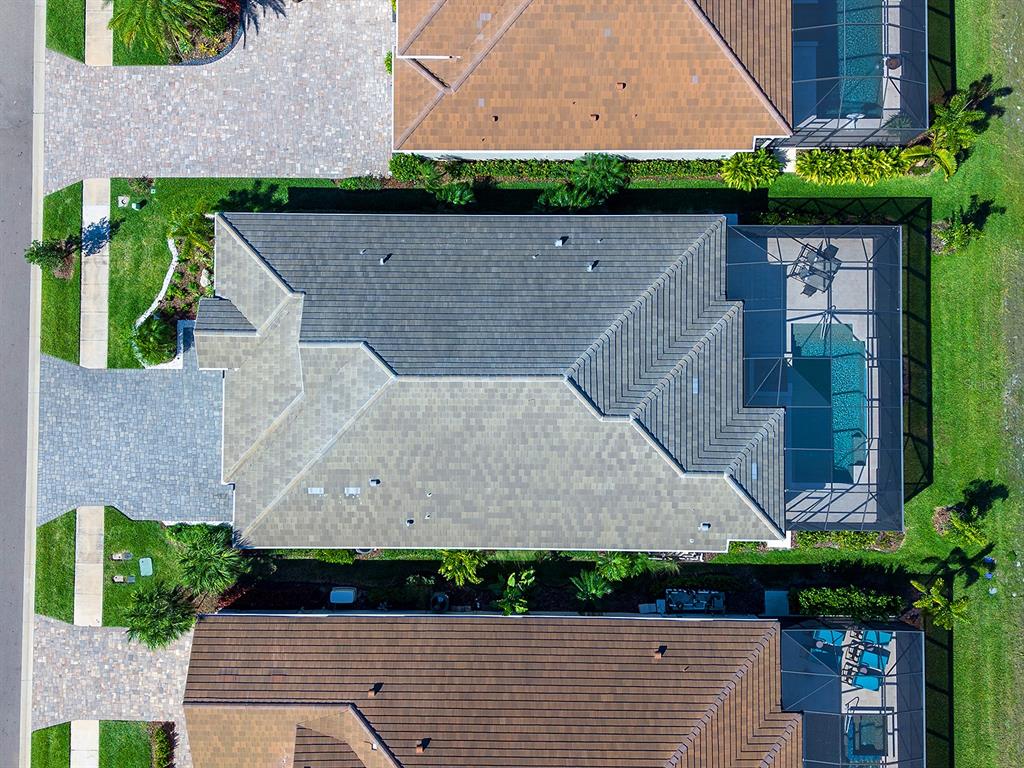 8043 Waterbend Trail Sarasota, FL 34240 - Photo 54 of 83 an aerial view of a house with a yard