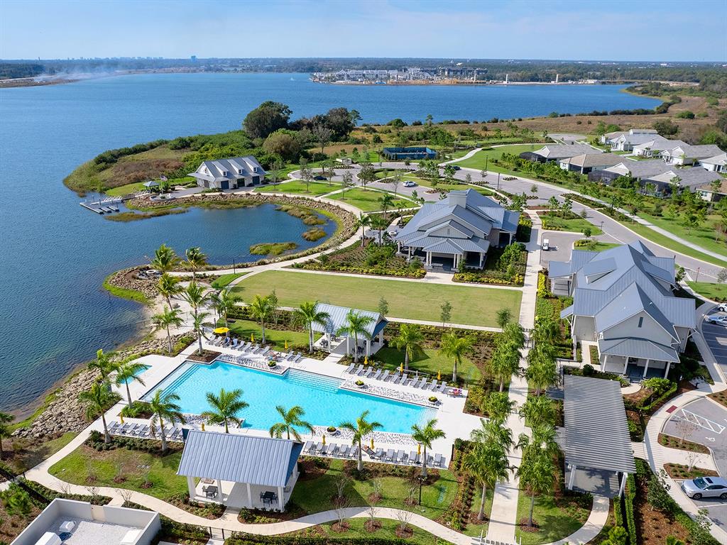 8043 Waterbend Trail Sarasota, FL 34240 - Photo 57 of 83 an aerial view of residential houses with outdoor space