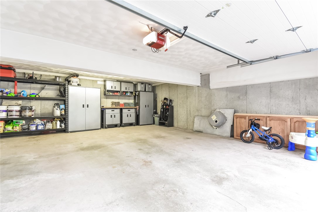 410 Trimtown Road Scituate, RI 02857 - Photo 33 of 39 Massive, clean garage with space for 2 vehicles at least!