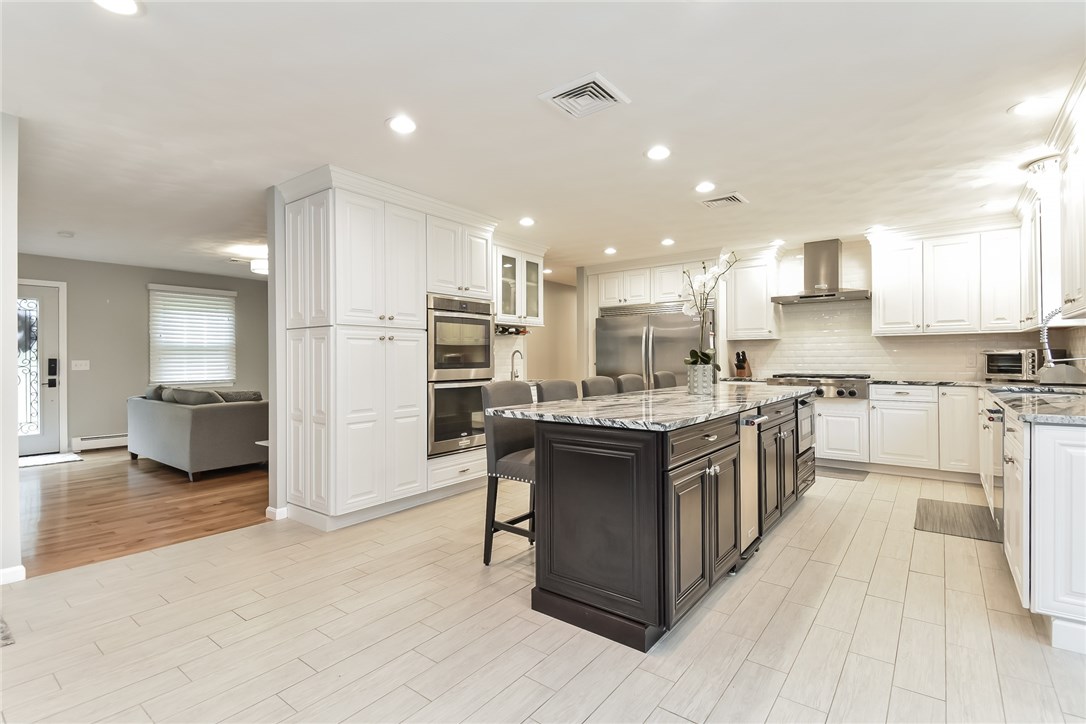 410 Trimtown Road Scituate, RI 02857 - Photo 5 of 39 Great open flow from family room to kitchen to living room