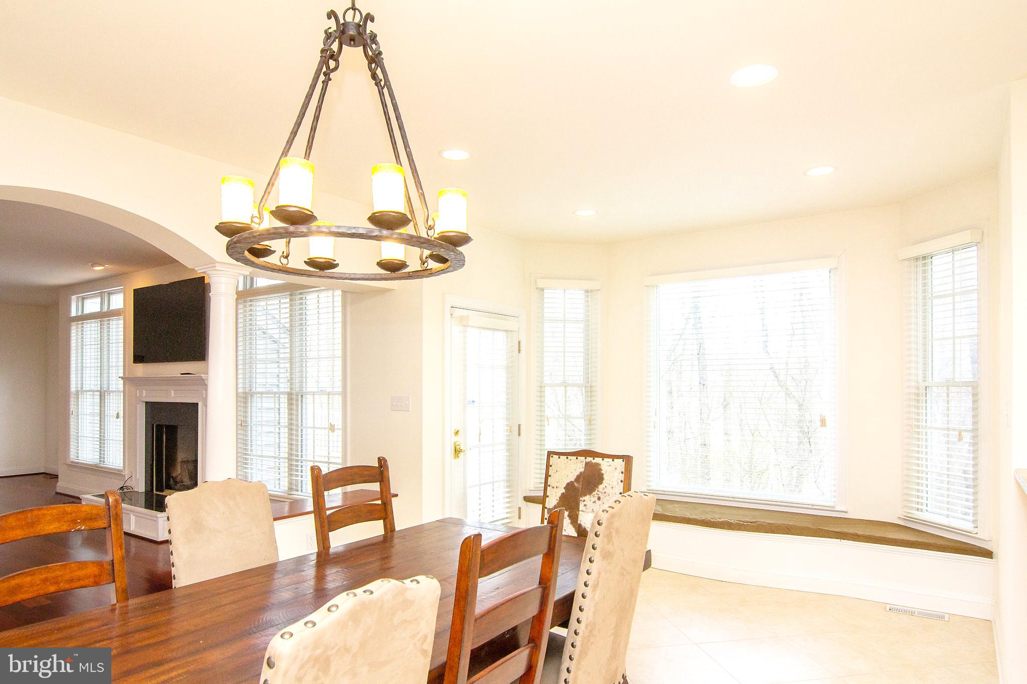 2089 Brown Road Finksburg, MD 21048 - Photo 12 of 31 a view of a dining room with furniture window and wooden floor