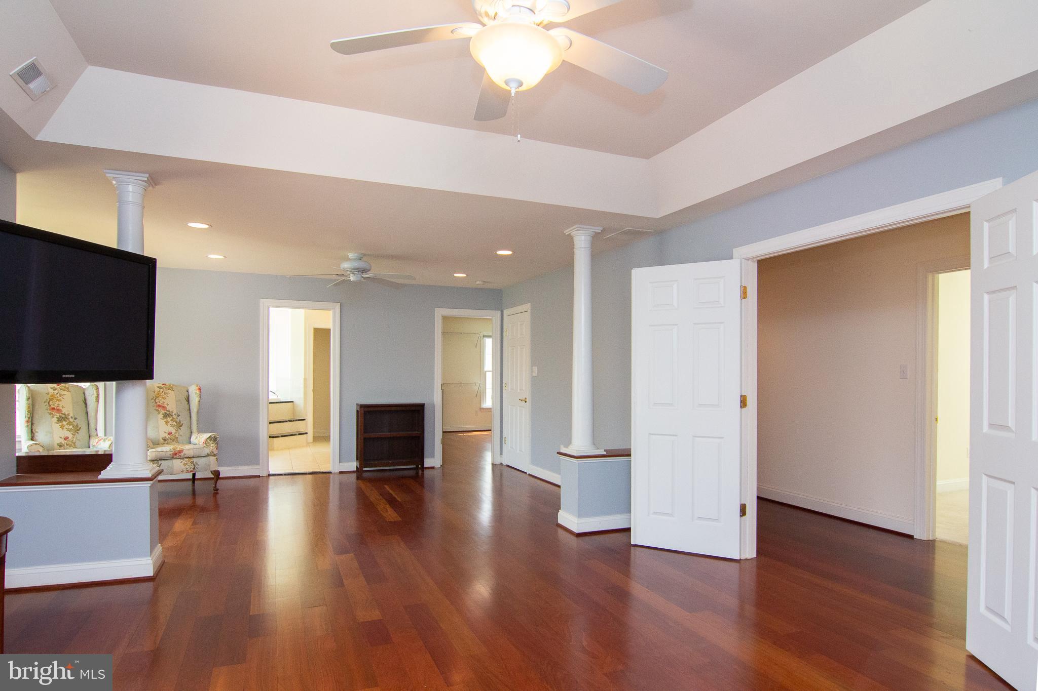 2089 Brown Road Finksburg, MD 21048 - Photo 17 of 31 a view of a living room with a flat screen tv and wooden floor