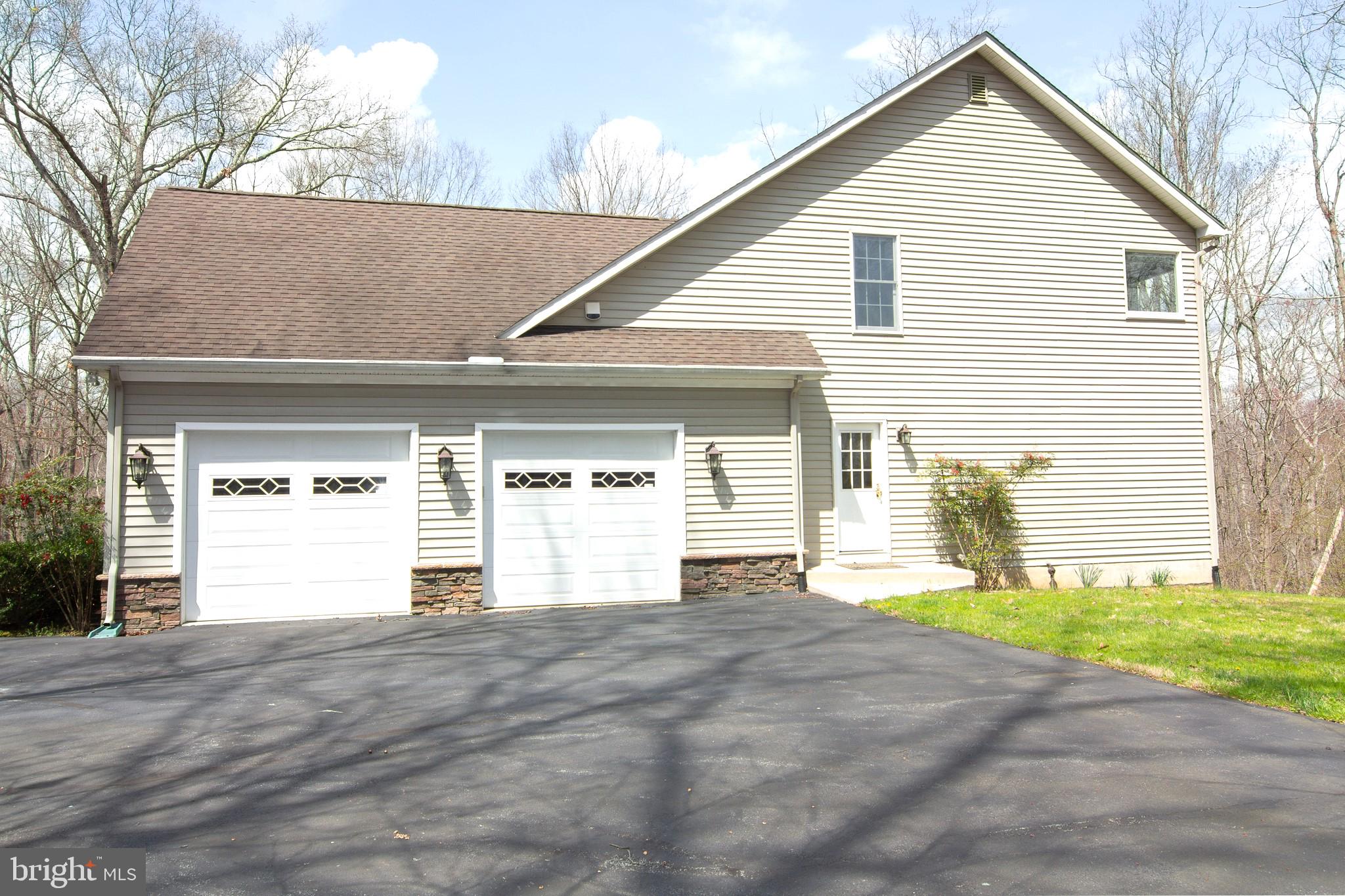 2089 Brown Road Finksburg, MD 21048 - Photo 2 of 31 a view of a house with a garage and yard