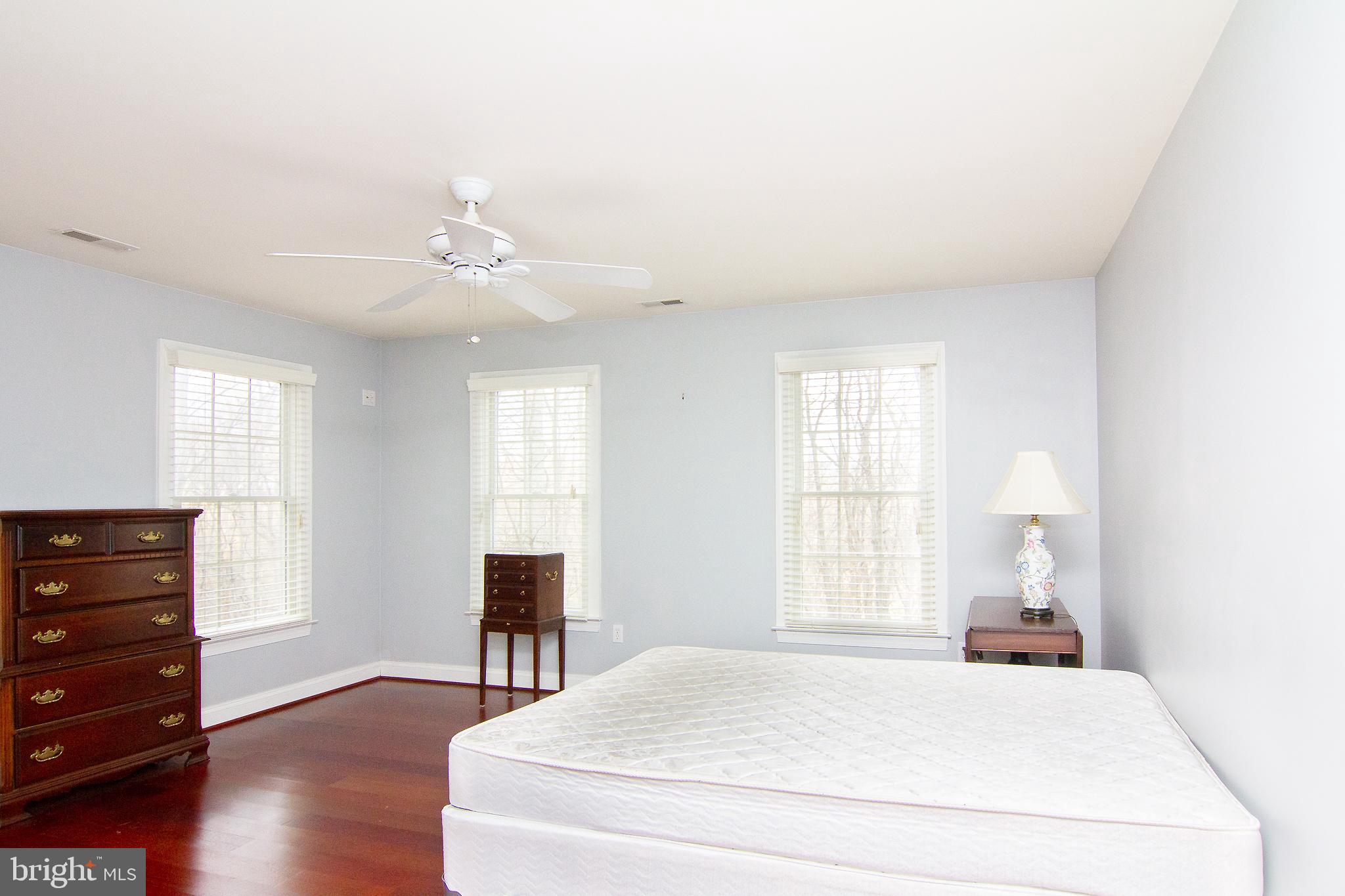 2089 Brown Road Finksburg, MD 21048 - Photo 21 of 31 a bedroom with a bed and wooden floor