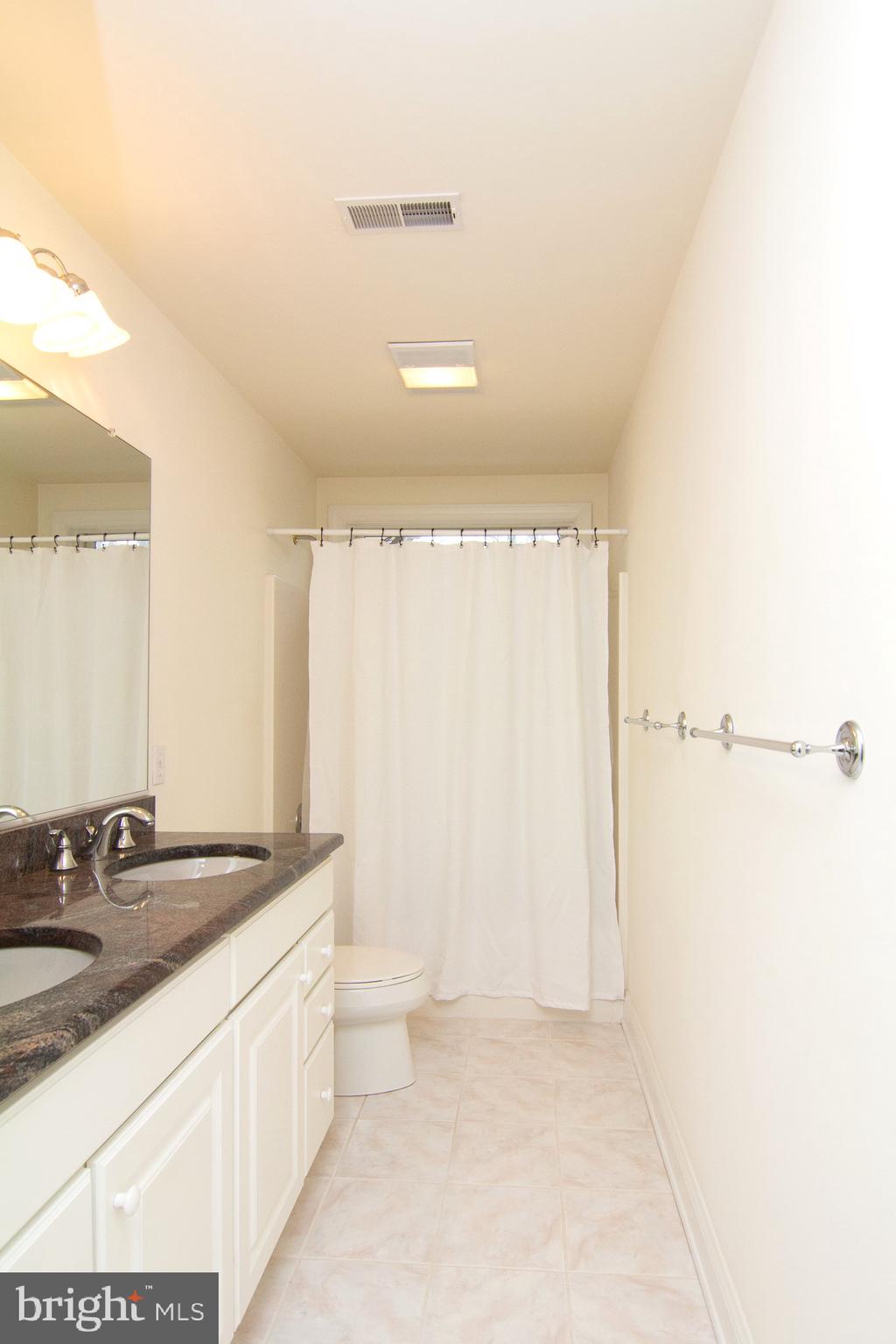 2089 Brown Road Finksburg, MD 21048 - Photo 26 of 31 a bathroom with a sink and a mirror