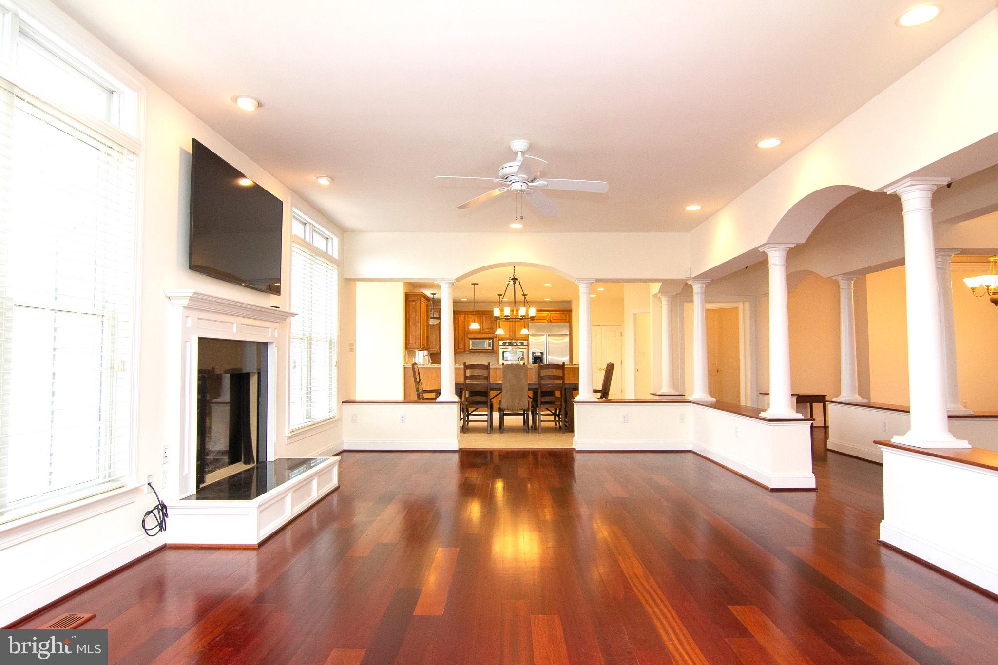 2089 Brown Road Finksburg, MD 21048 - Photo 8 of 31 a living room with fireplace furniture and a wooden floor