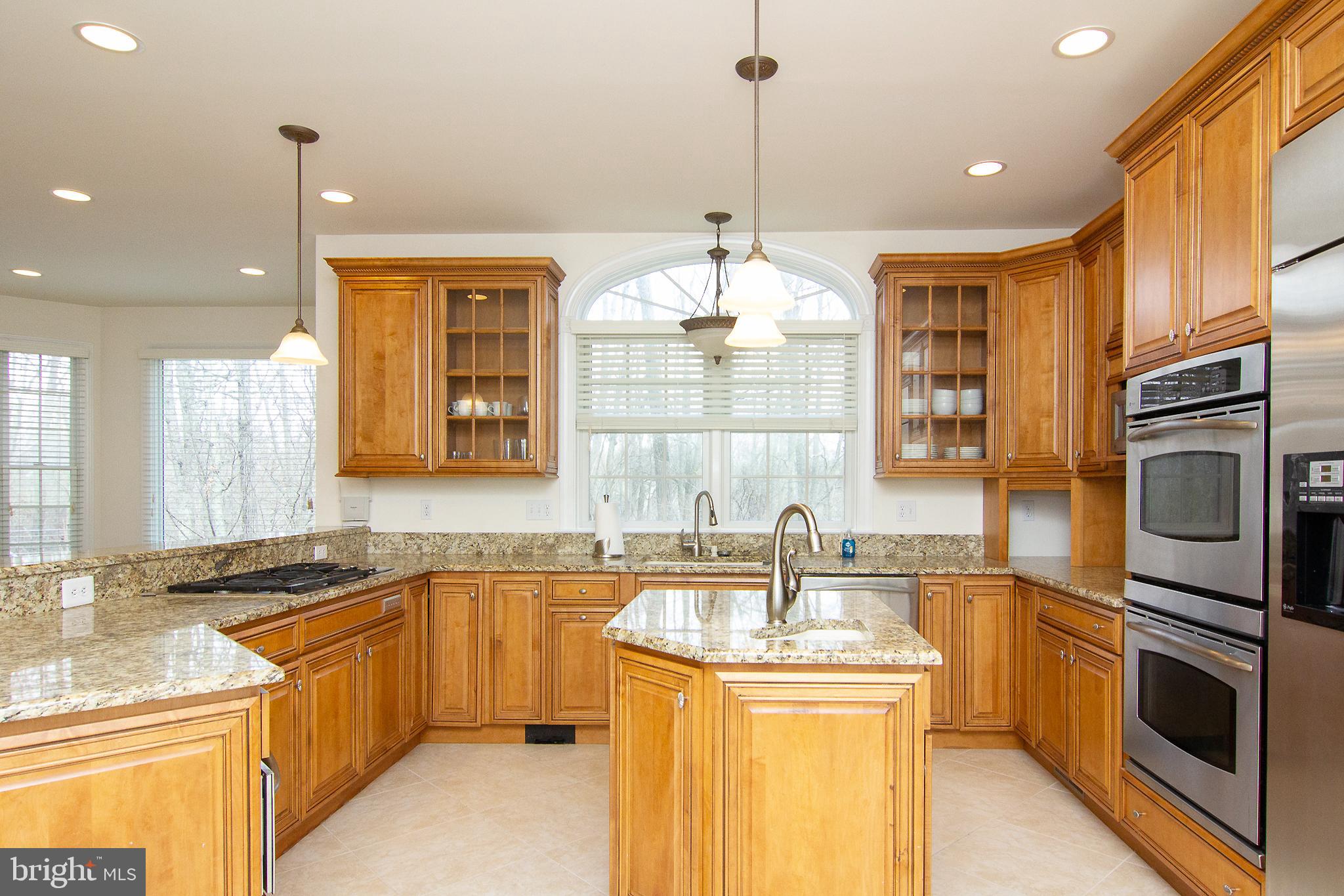 2089 Brown Road Finksburg, MD 21048 - Photo 10 of 31 a kitchen with a sink stove and refrigerator