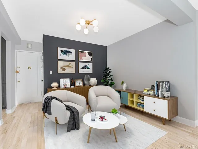 a living room with furniture and window