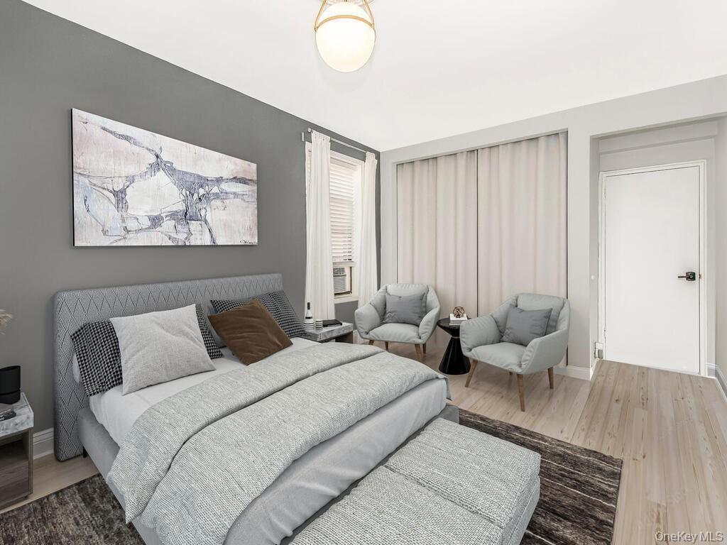 645 West 239th Street, Unit 4D Bronx, NY 10463 - Photo 10 of 13 Bedroom with wood finished floors and baseboards