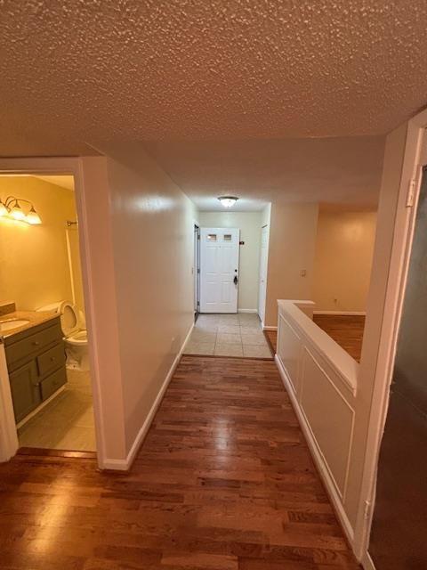 38 Rumson Court Smyrna, GA 30080 - Photo 15 of 38 a view of a hallway with wooden floor