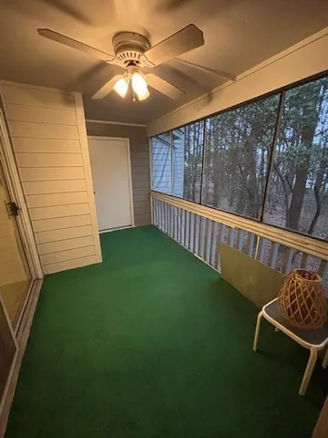 a view of yard with trampoline