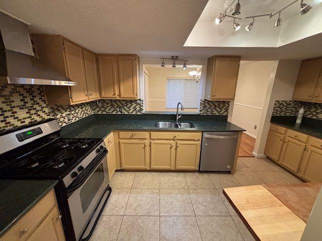 38 Rumson Court Smyrna, GA 30080 - Photo 7 of 38 a kitchen with a sink and a stove top oven