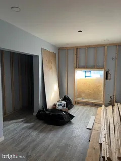 a view of a livingroom with a furniture and window