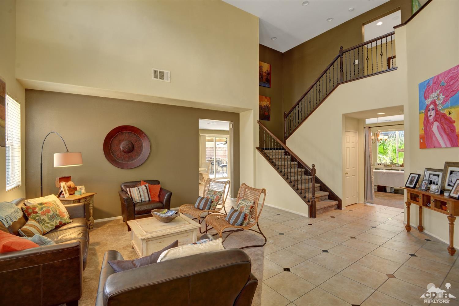 37458 Blackburn Road Indio, CA 92203 - Photo 3 of 33 a living room with furniture and a large window