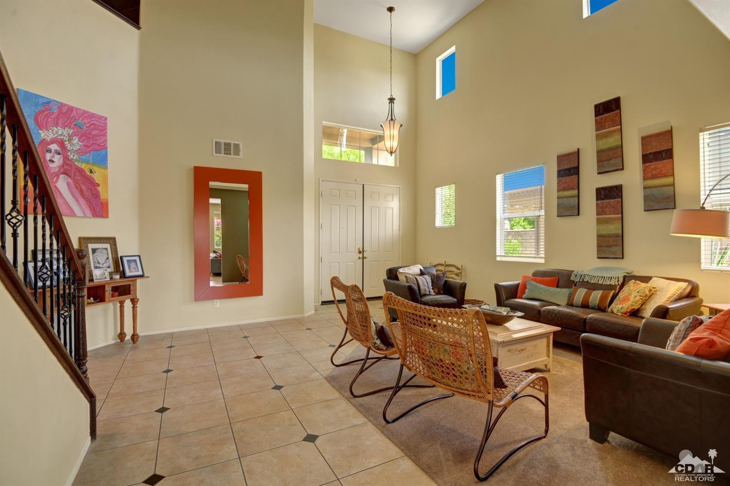 37458 Blackburn Road Indio, CA 92203 - Photo 4 of 33 a living room with furniture and a window