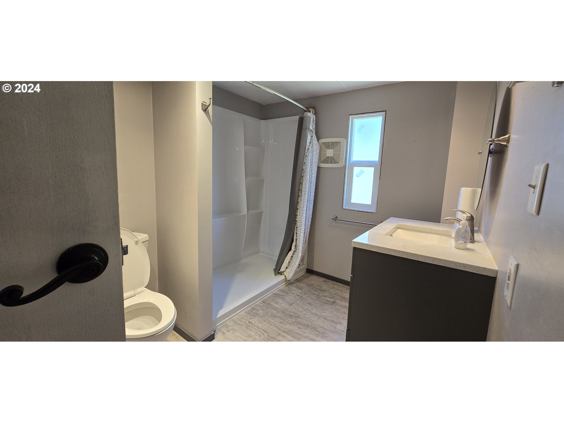 7080 Thurston Road, Unit 12 Springfield, OR 97478 - Photo 9 of 13 a bathroom with a sink and a mirror