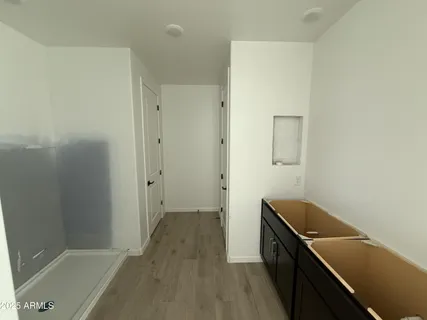 a view of small space with racks on the wall