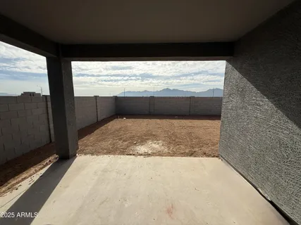 a view of a backyard of a house