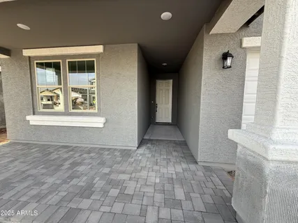a view of a hallway with windows