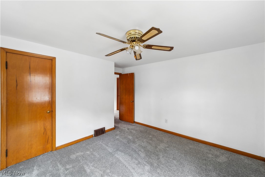 1655 Lyndhurst Road Cleveland, OH 44124 - Photo 19 of 30 Unfurnished room featuring carpet flooring and ceiling fan