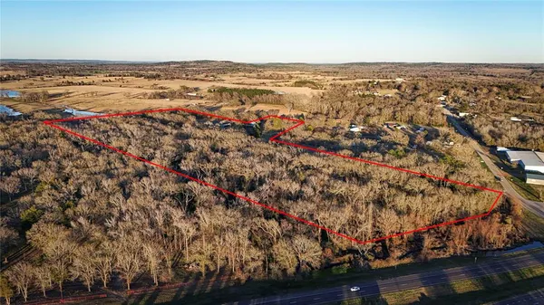 an aerial view of residential building and ocean