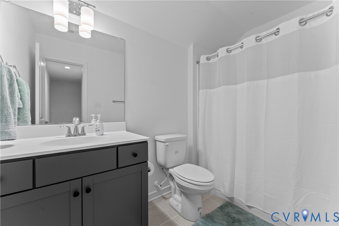 8819 Roberta Road Mechanicsville, VA 23116 - Photo 59 of 79 Bathroom featuring a vanity with dark cabinetry, w