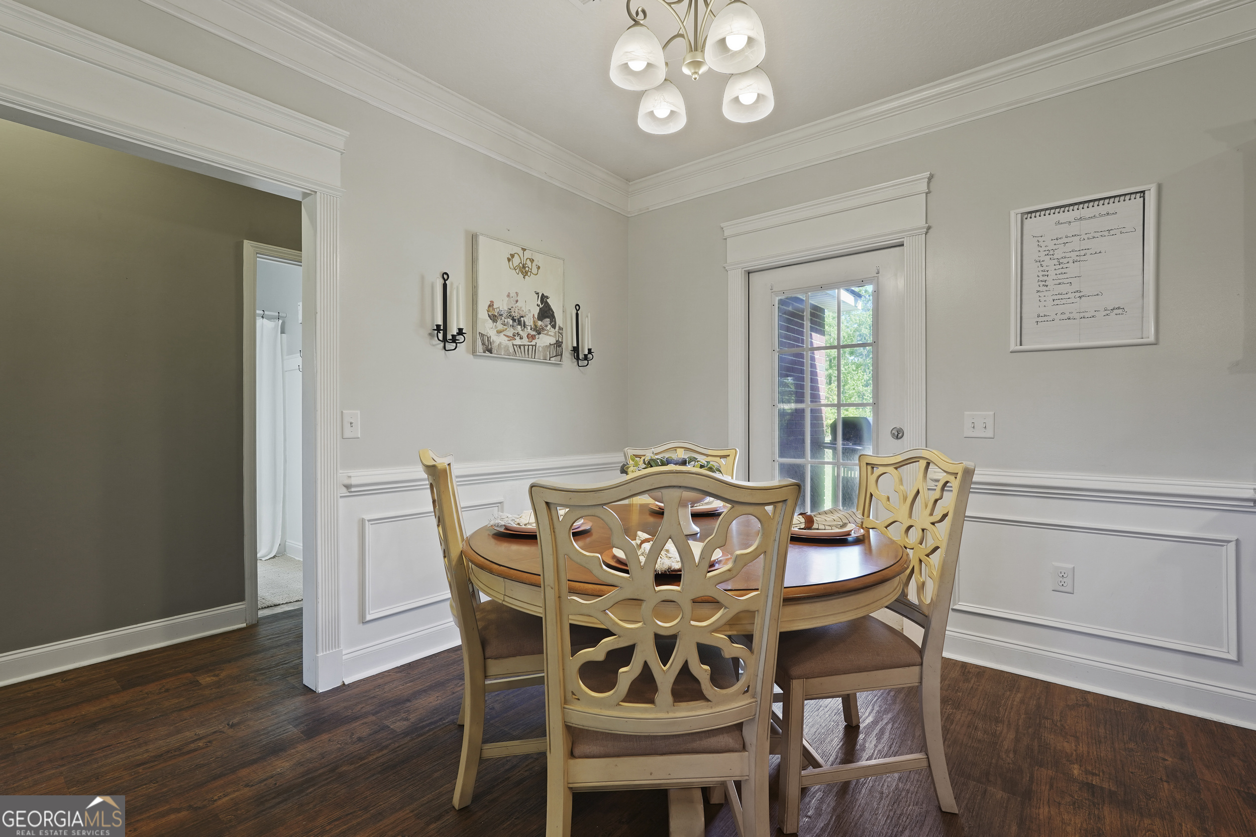 1653 Sutherland Road Townsend, GA 31331 - Photo 16 of 73 a view of a dining room with furniture and wooden floor