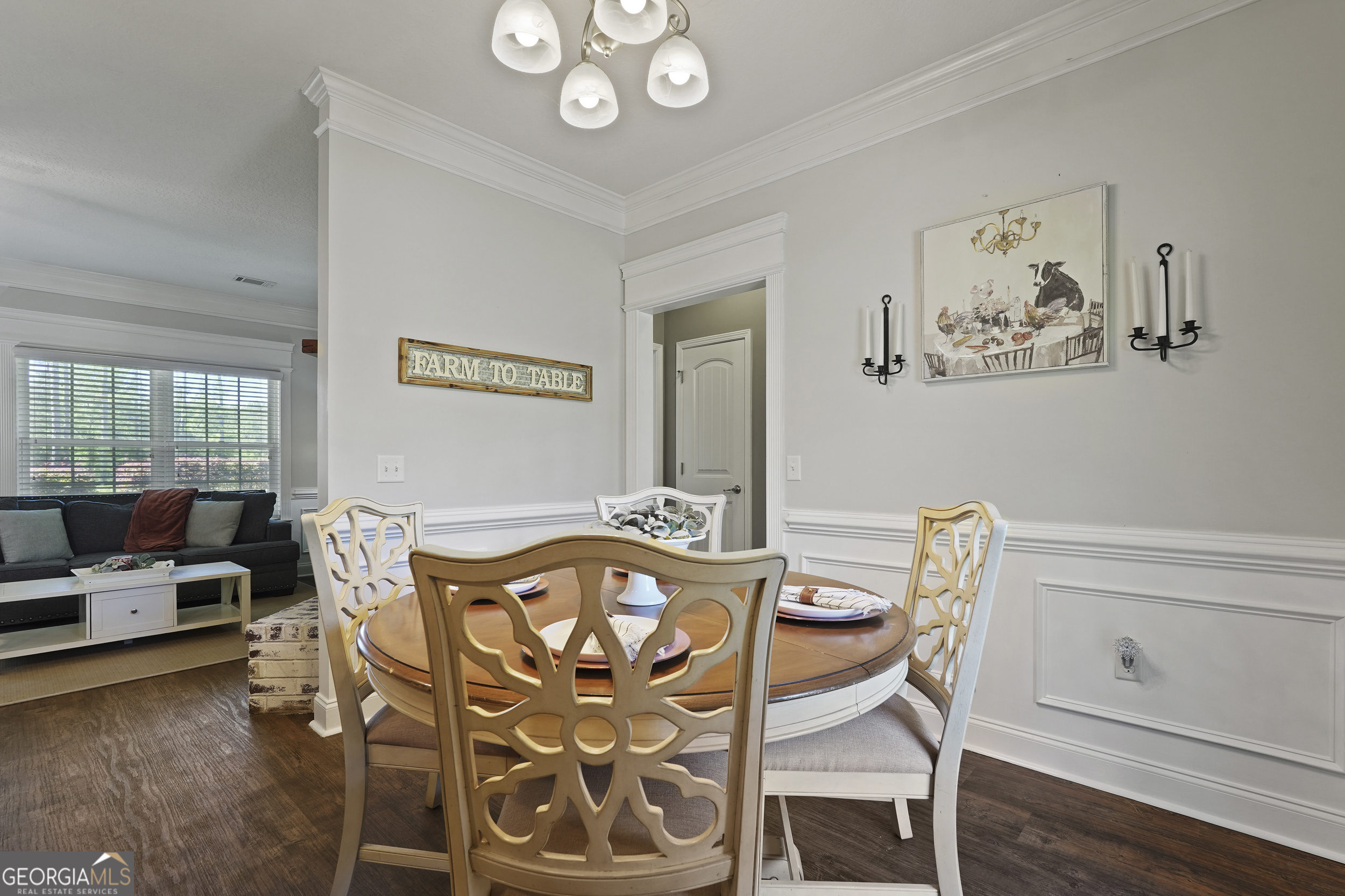 1653 Sutherland Road Townsend, GA 31331 - Photo 17 of 73 a view of a dining room with furniture and wooden floor