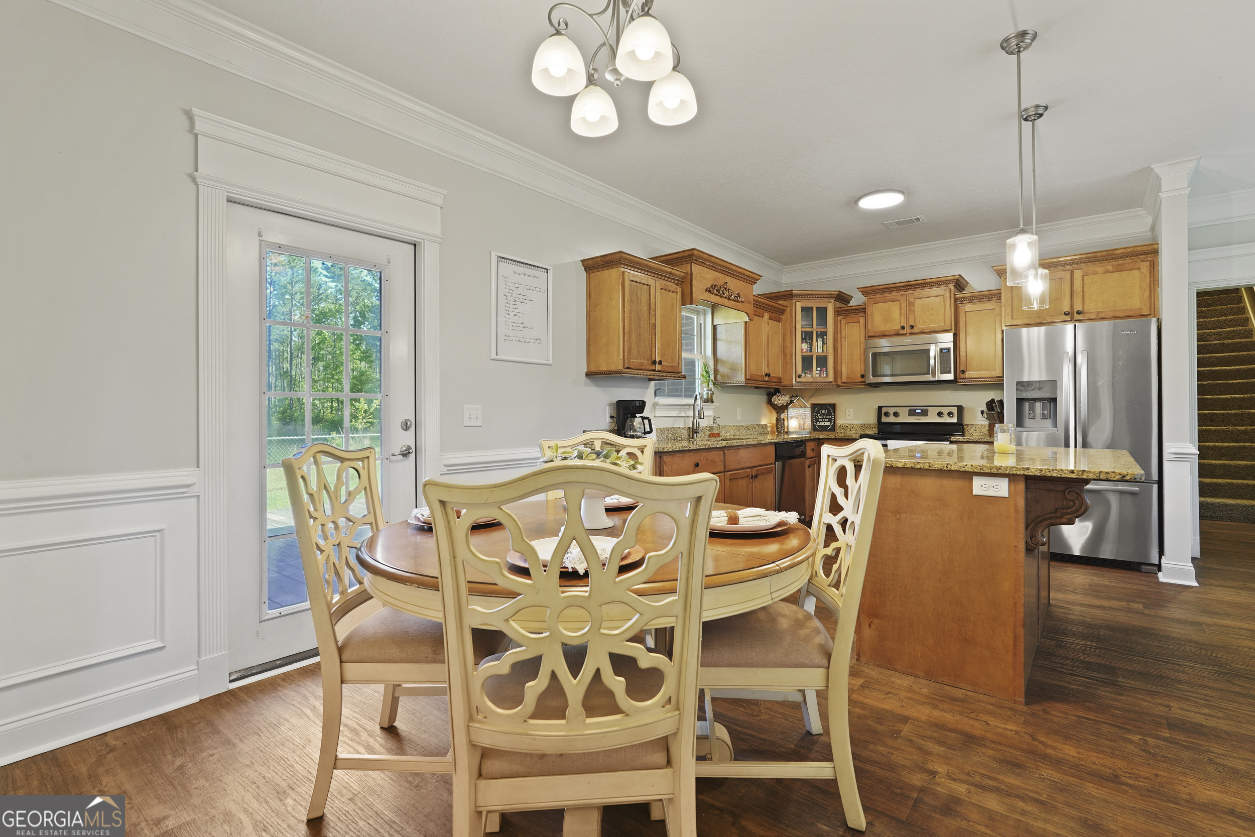 1653 Sutherland Road Townsend, GA 31331 - Photo 19 of 73 a view of a dining room with furniture window and wooden floor