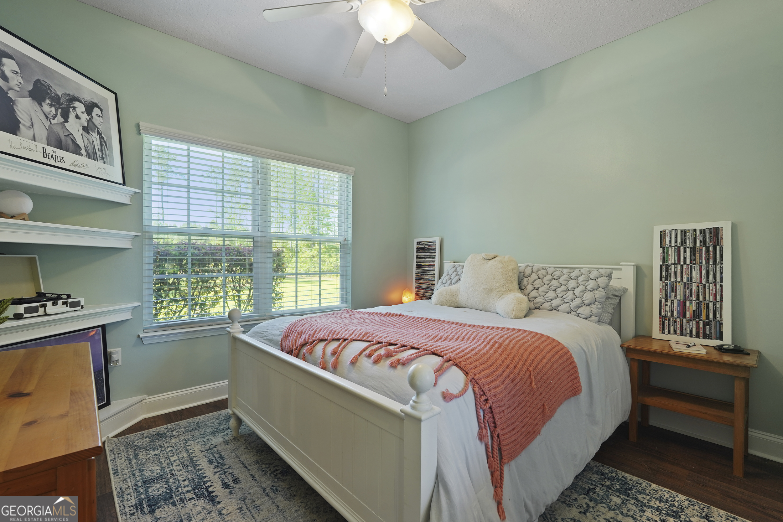 1653 Sutherland Road Townsend, GA 31331 - Photo 27 of 73 a bed sitting in a bedroom next to a window