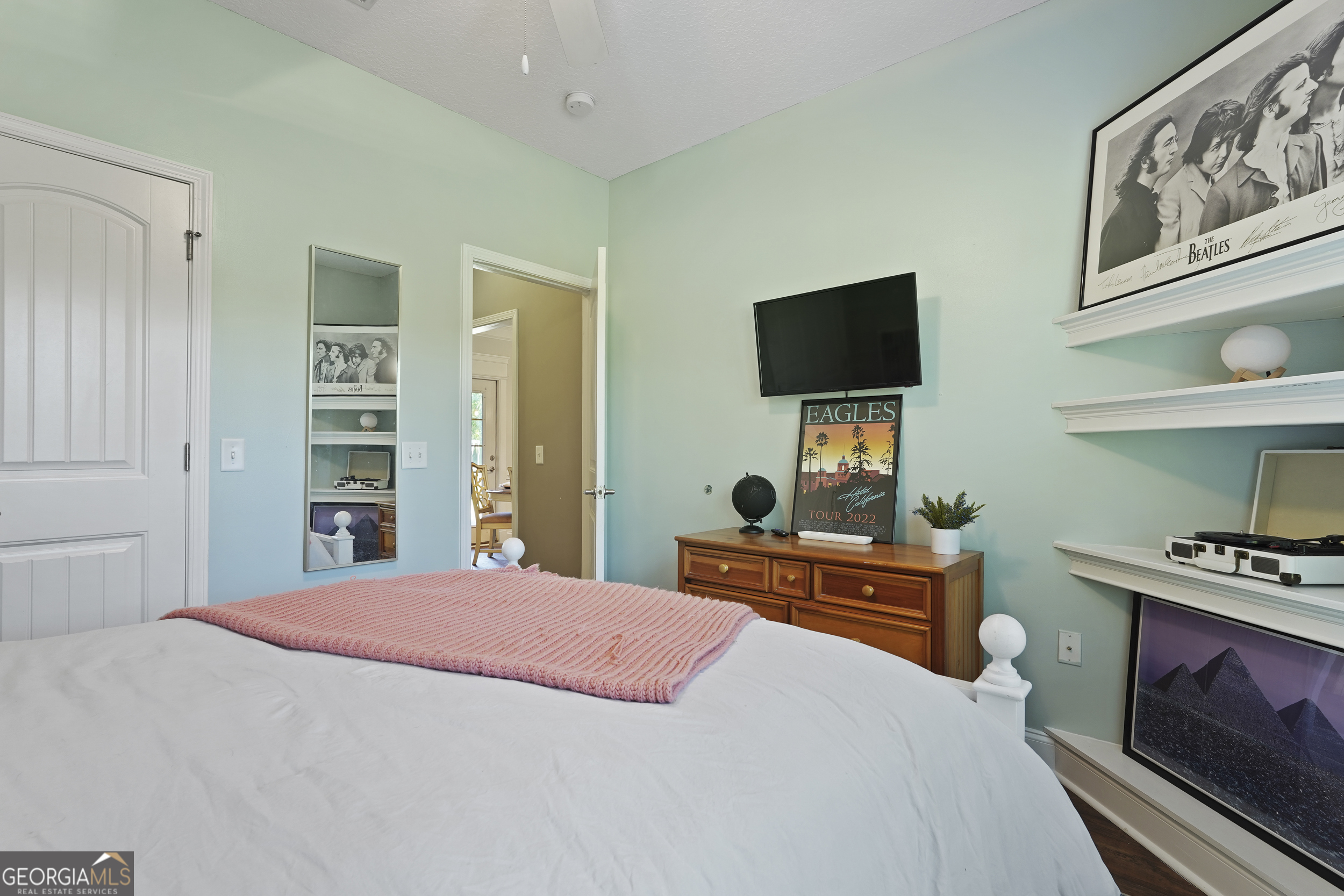 1653 Sutherland Road Townsend, GA 31331 - Photo 28 of 73 a bedroom with a bed and a flat screen tv