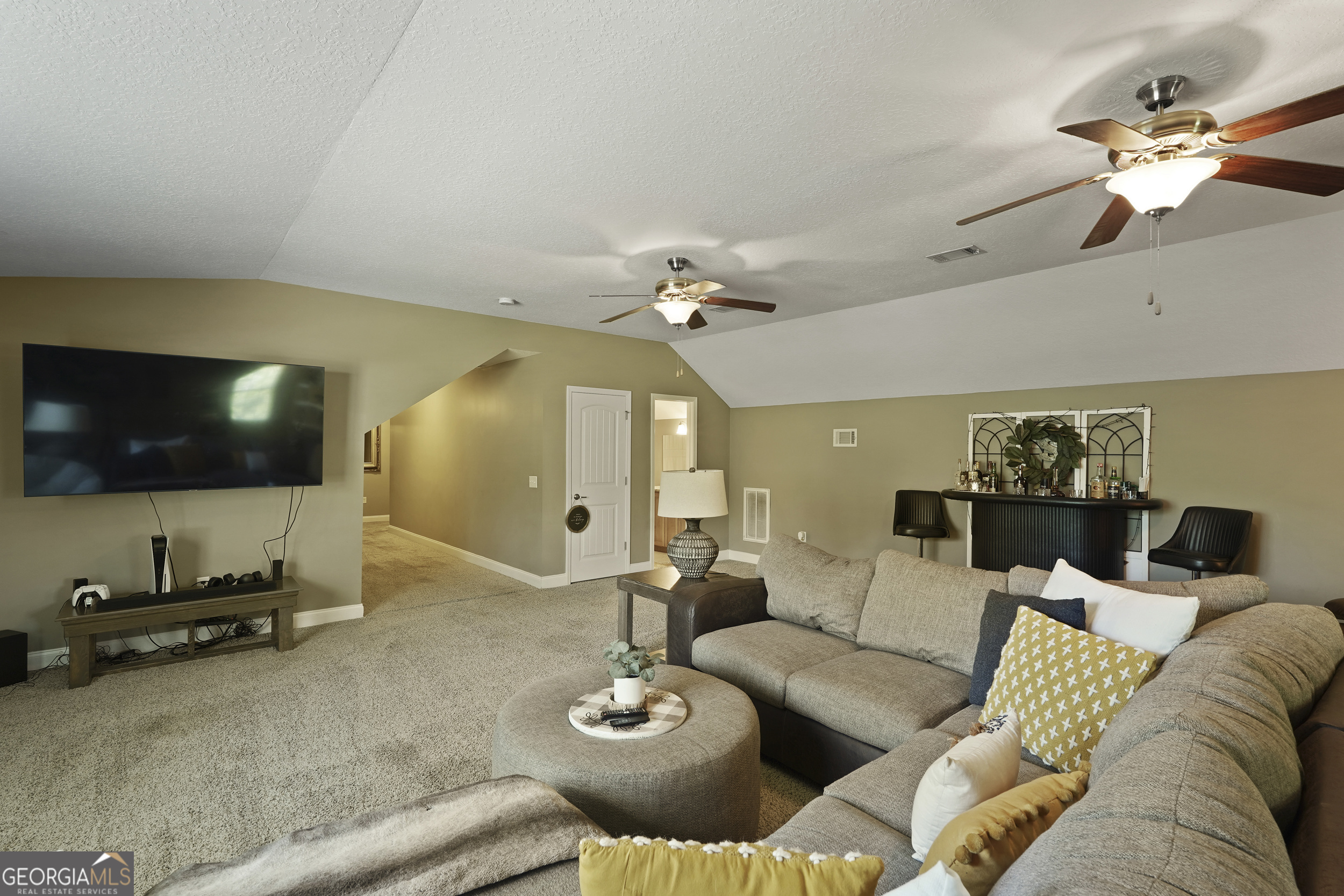 1653 Sutherland Road Townsend, GA 31331 - Photo 49 of 73 a living room with furniture and a flat screen tv
