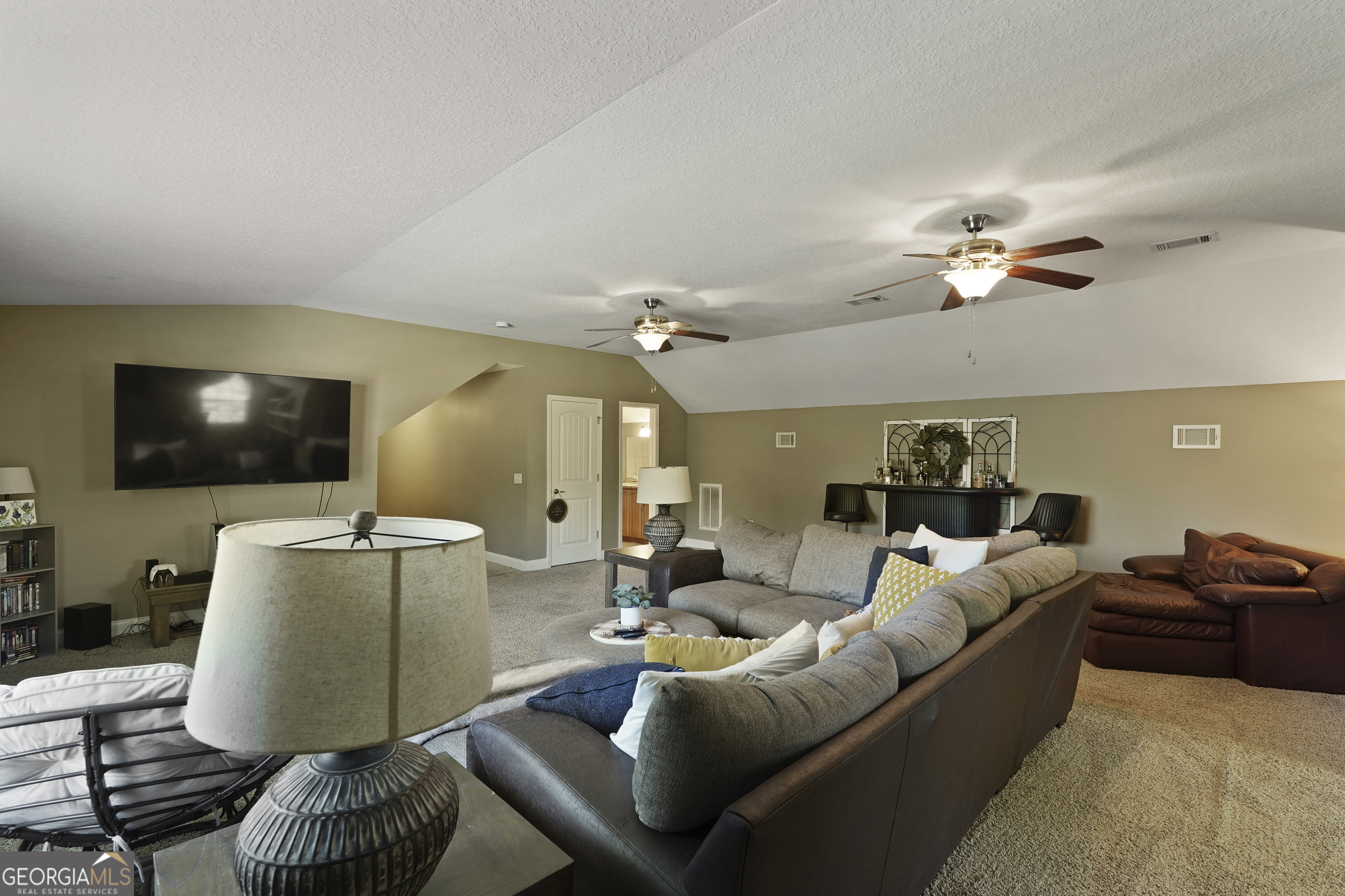 1653 Sutherland Road Townsend, GA 31331 - Photo 50 of 73 a living room with furniture and a flat screen tv