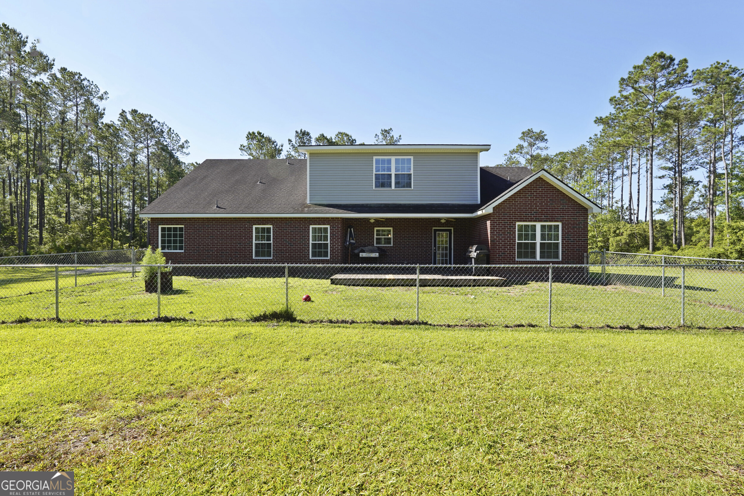 1653 Sutherland Road Townsend, GA 31331 - Photo 61 of 73 a view of a house with a swimming pool