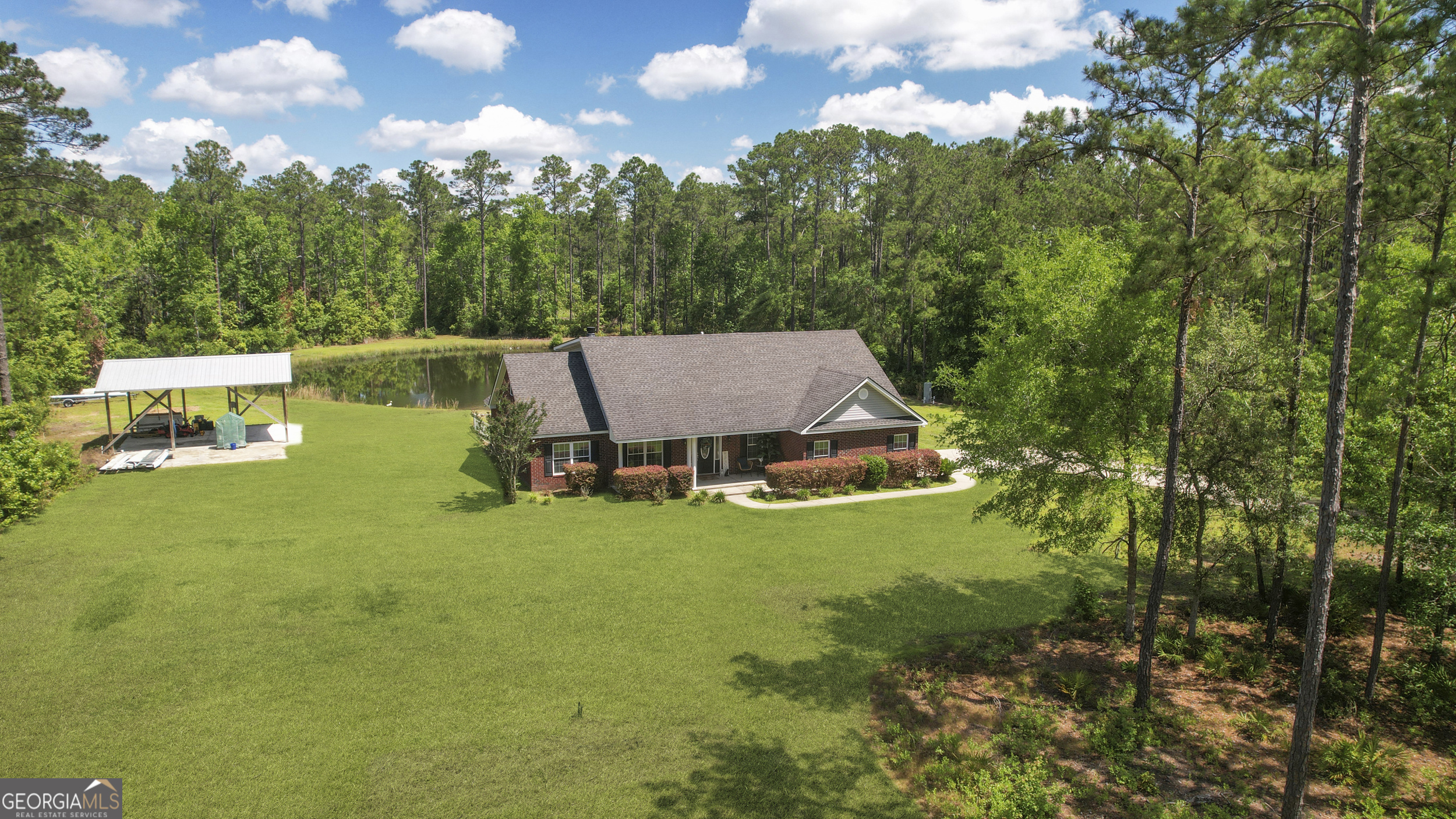 1653 Sutherland Road Townsend, GA 31331 - Photo 65 of 73 a view of a house with a yard
