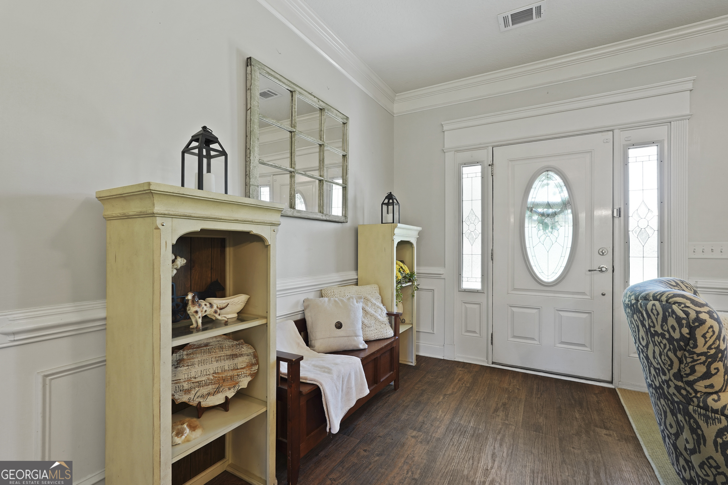 1653 Sutherland Road Townsend, GA 31331 - Photo 8 of 73 a living room with furniture and a clock