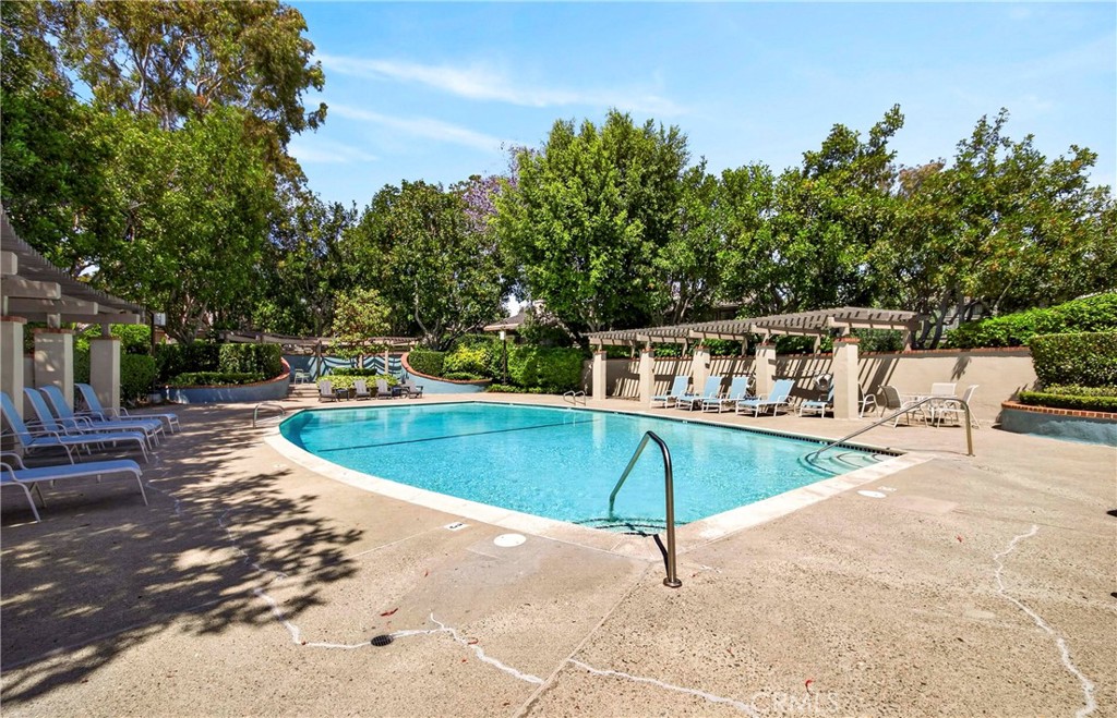 9 Madrona Irvine, CA 92612 - Photo 33 of 38 a view of a swimming pool with chairs