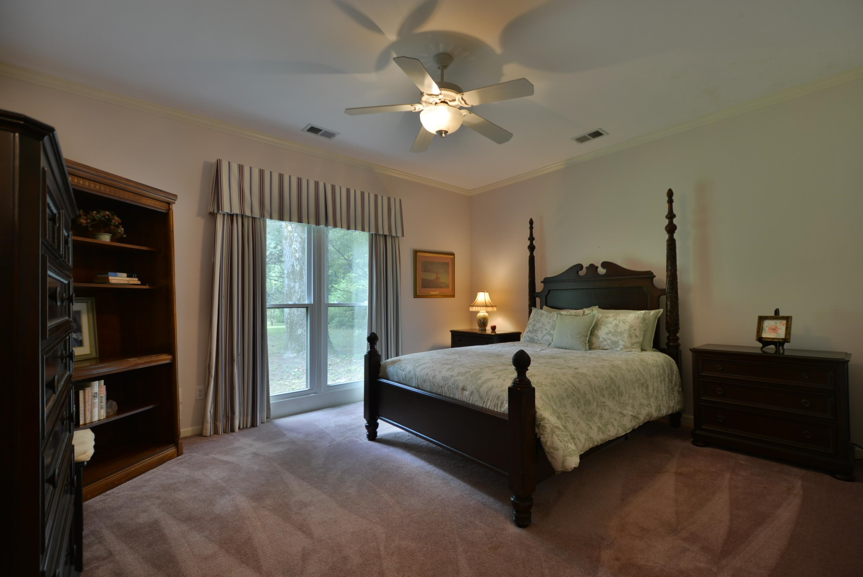 6500 State Line Road Memphis, TN 38141 - Photo 15 of 40 Carpeted bedroom featuring crown molding and ceiling fan
